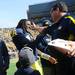 Michigan senior quarterback Denard Robinson smiles as he embraces head coach Brady Hoke during a senior day ceremony before the last home game of the season at Michigan Stadium. Melanie Maxwell I AnnArbor.com